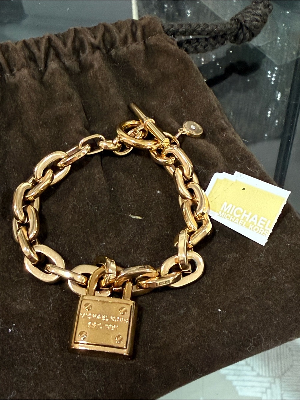 Michael Kors rose gold padlock toggle bracelet dustbag book incl